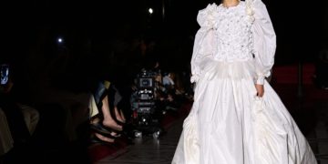 Chanel presents haute couture apparel at the Opera theater in Paris.