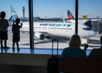 It now costs $25 to make a phone reservation with WestJet. Do airline surcharges have too much power?